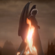 A shadowed figure with blonde hair and leathery wings stands behind a tall flame.